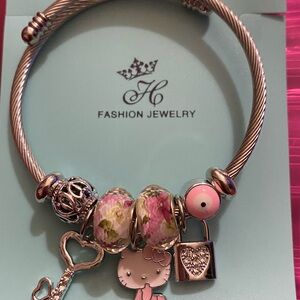 Silver and Pink Charm Bracelet